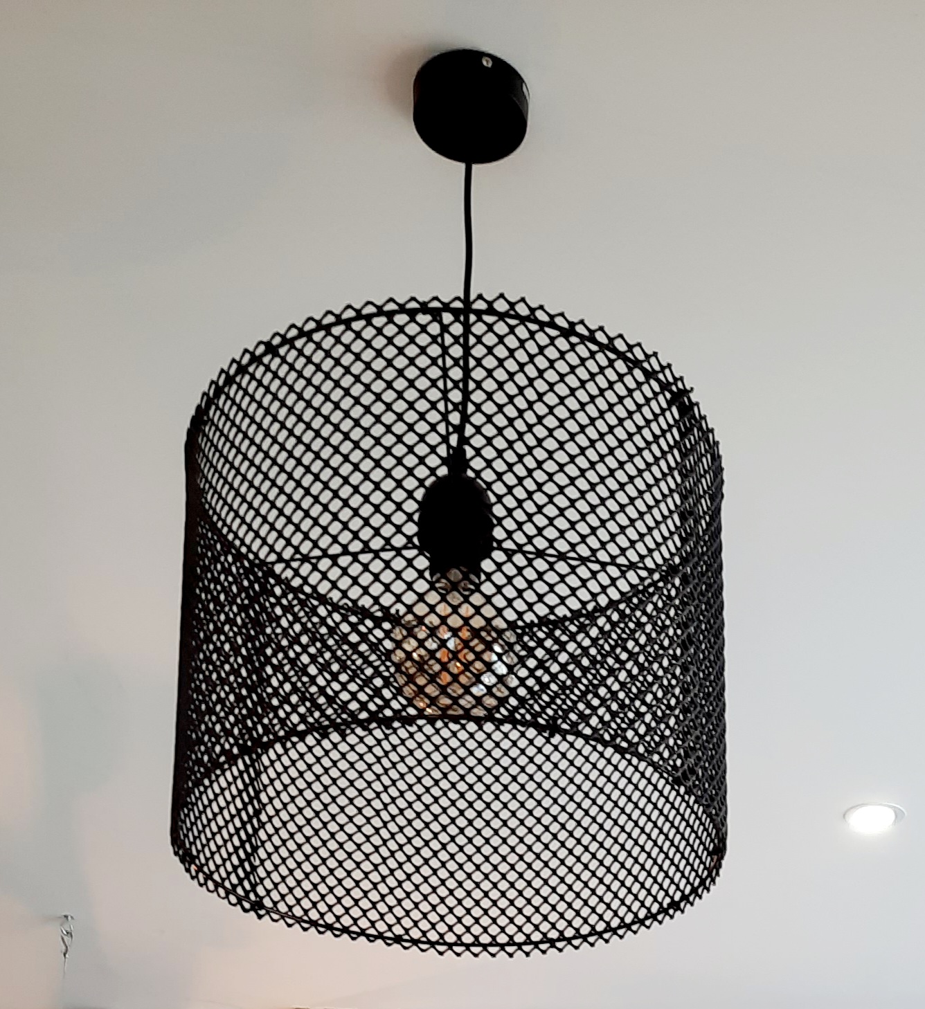 Suspension luminaire en poche à huîtres recyclée